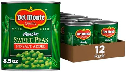 Canned Del Monte sweet peas in 8.5-ounce cans, no salt added, showing bright green peas inside the can.