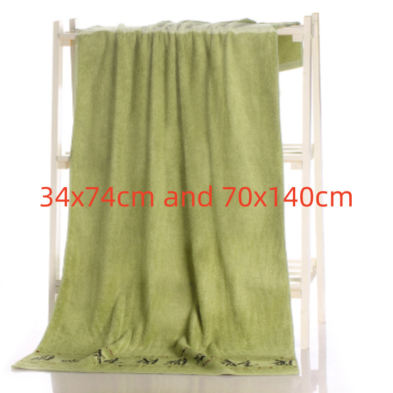 Bamboo charcoal fiber bath towel in soft textured fabric, folded for display