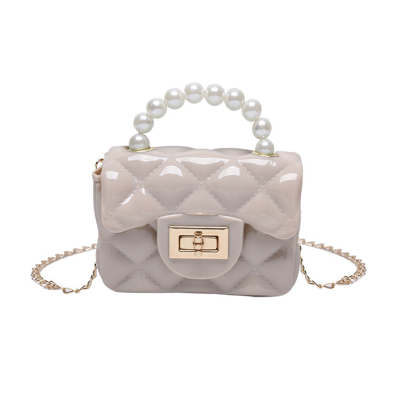 Pearl hand one-shoulder crossbody chain children's bag with decorative pearl handle and shoulder strap