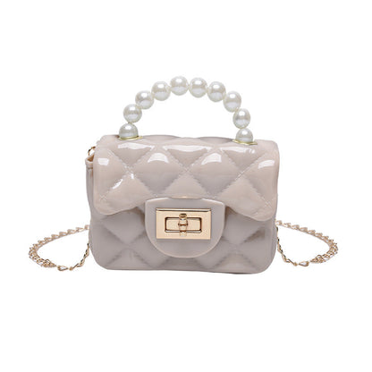 Pearl hand one-shoulder crossbody chain children's bag with decorative pearl handle and shoulder strap