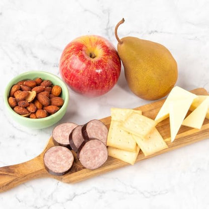 A Gift Inside gourmet gift basket with fresh fruit, nuts, meats, and cheeses arranged for corporate gifts and special occasions.