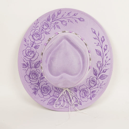 Western cowboy hat with embossed laser-engraved design and tall top hat crown