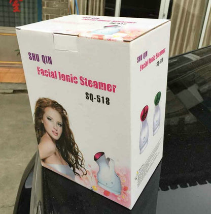 Humidifying steaming machine by My Store with visible water tank and steam nozzle
