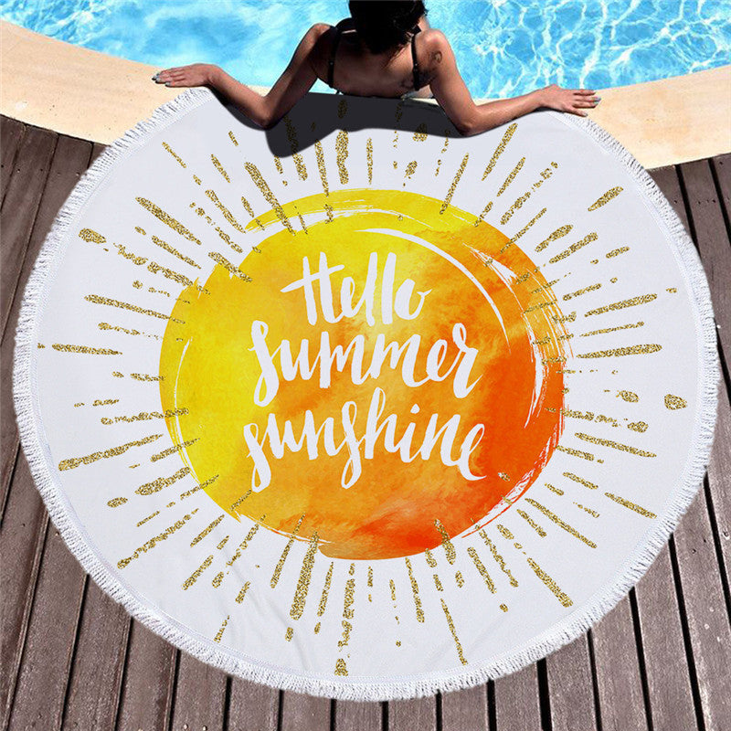 Printed microfiber beach towel and bath towel used as a colorful beach cushion
