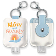 Studio Oh! Hand Sanitizer Holder with Travel Bottle Refillable Mini Bottle in Slow and Steady with Portable Keychain Holder Keeps Hands Clean & Germ-Free