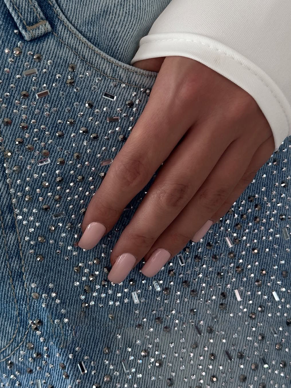 Irregular rhinestone jeans from Anybestbuy Store featuring unique distressed design and sparkling rhinestone embellishments.