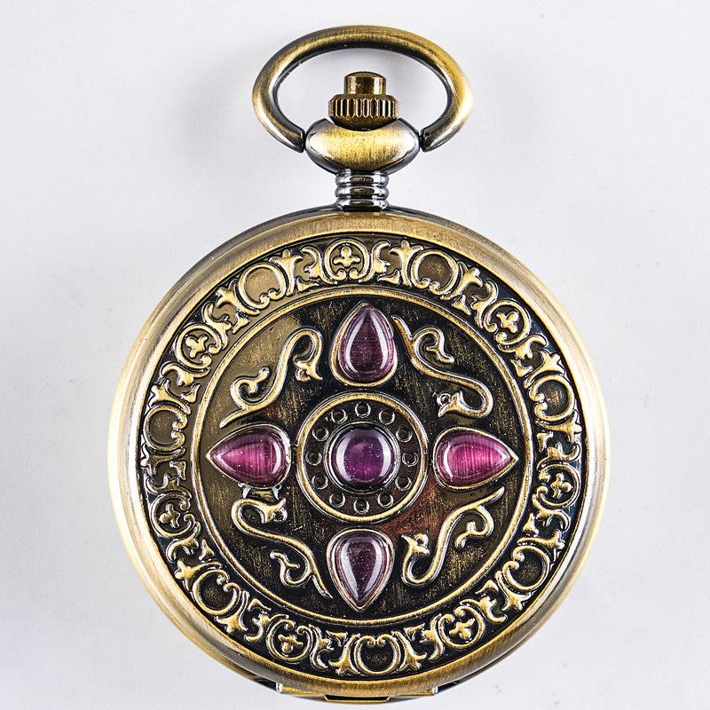 Retro flip-open mechanical pocket watch with vintage-style metal case and visible clock face