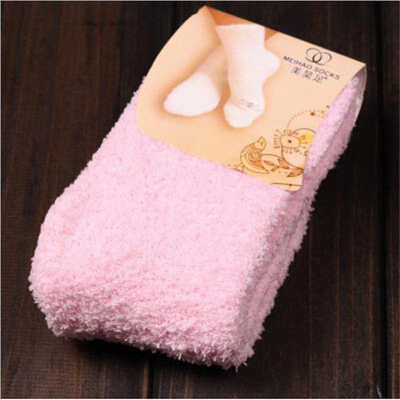 Warm feet on bed in household warm socks by My Store