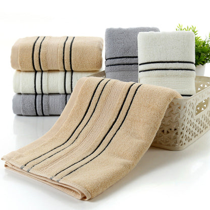 Pure cotton bath towel by My Store, soft white household towel with textured fabric close-up