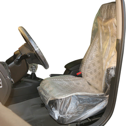 Disposable car repair seat cover for vehicle interiors, protective plastic seat cover displayed flat