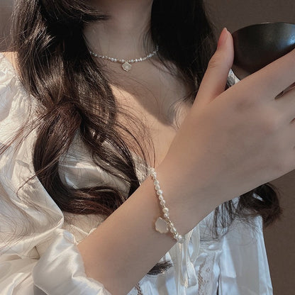 Women's freshwater shell and freshwater pearl necklace bracelet jewelry set