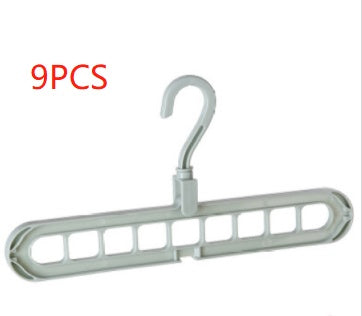 9-hole clothes hanger organizer, space-saving hanger in white plastic, viewed from the front