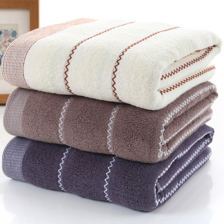 Cotton embroidered towel with detailed stitched design in soft absorbent fabric