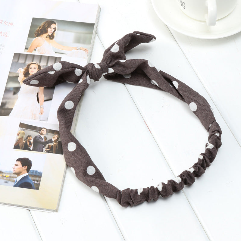 Big bow tie bunny ears headband with soft white ears and colorful bow detail