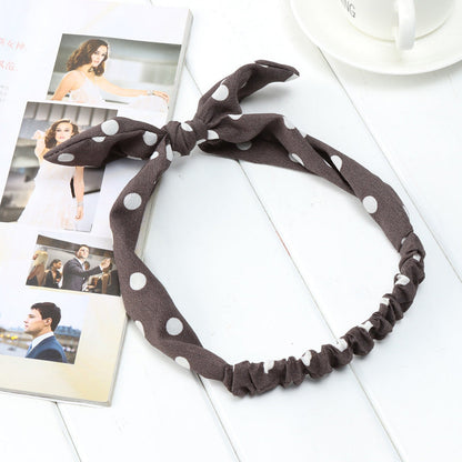 Big bow tie bunny ears headband with soft white ears and colorful bow detail