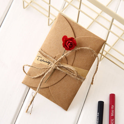 Creative kraft dried flower greeting card with natural floral design and rustic paper finish