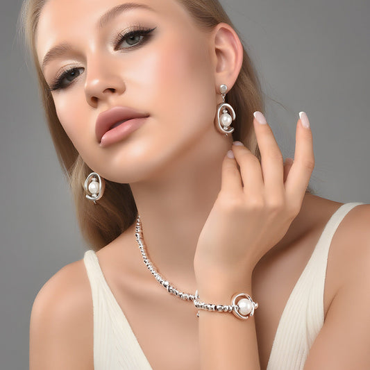 3-piece broken silver big pearl jewelry set with necklace, bracelet, and earrings for women