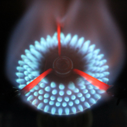 Mini camping stove displayed against a plain background