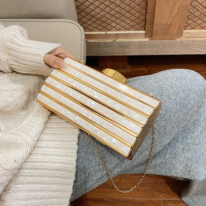 Women's high-end patch acrylic evening bag with structured design and decorative patch detail