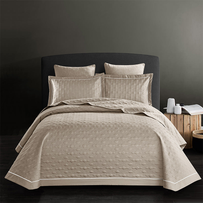 Twill cotton bed sheet in soft woven fabric, displayed flat in a neutral color