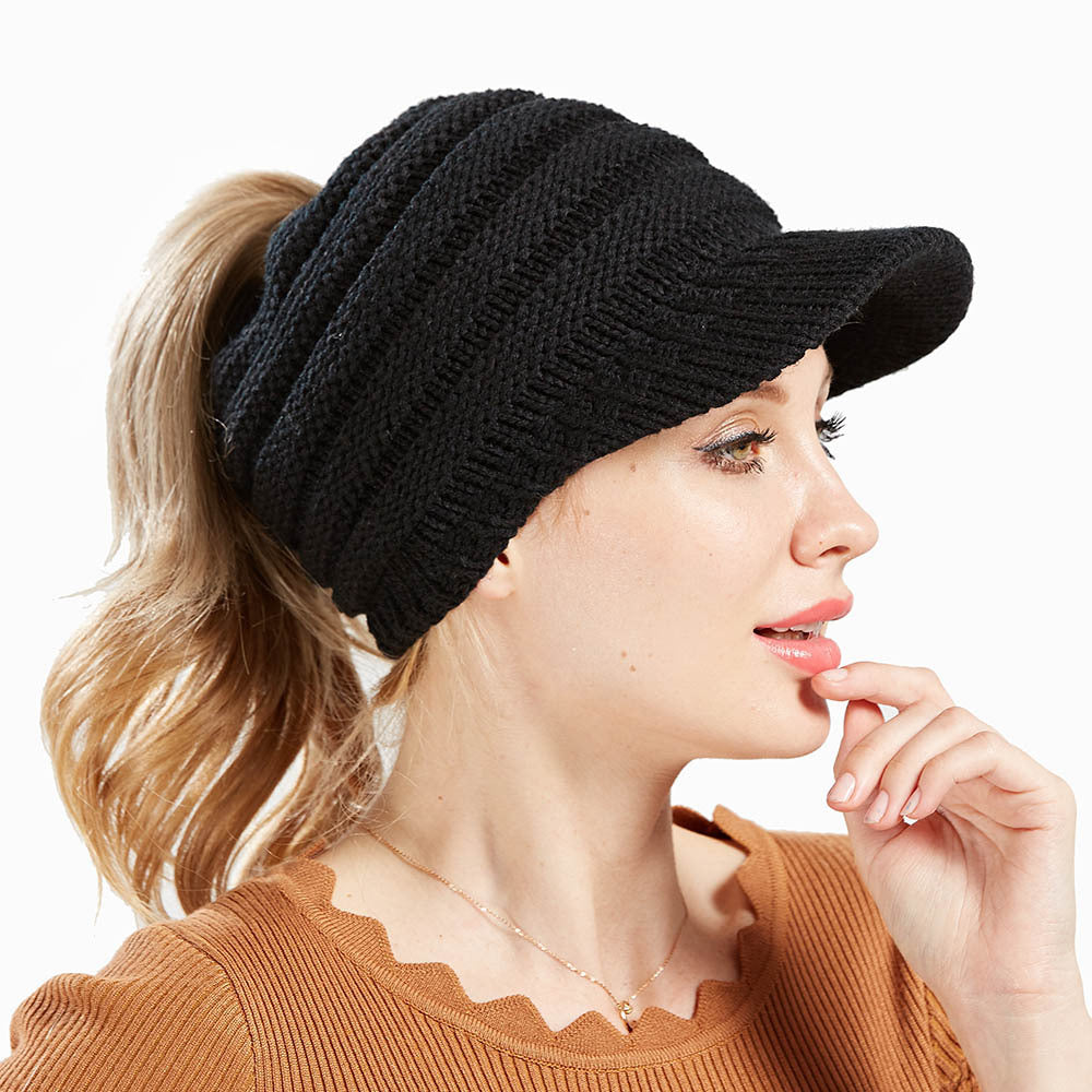 Women's soft knitted ponytail beanie, warm autumn winter hat in a classic skullie style