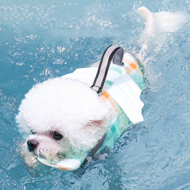 Dog swimming life jacket in small, medium, and large sizes with adjustable straps and flotation design