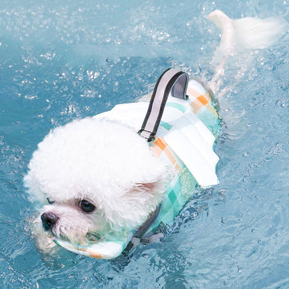 Dog swimming life jacket in small, medium, and large sizes with adjustable straps and flotation design
