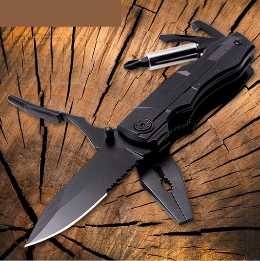 Portable folding multi-purpose knife and pliers tool for outdoor travel, shown closed