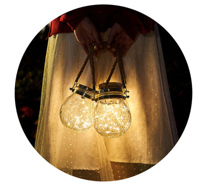 Crack ball glass jar light with textured clear glass globe and warm ambient design
