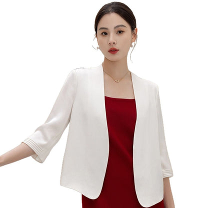Women's five-quarter-sleeve versatile short blazer in a tailored design, front view