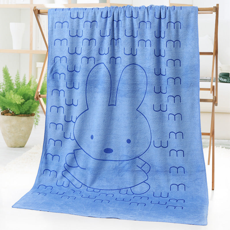 Cartoon print bath towel beach towel displayed flat showing colorful illustrated design