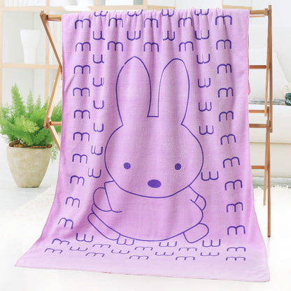 Cartoon print bath towel beach towel with colorful illustrated design, soft terry texture visibly detailed