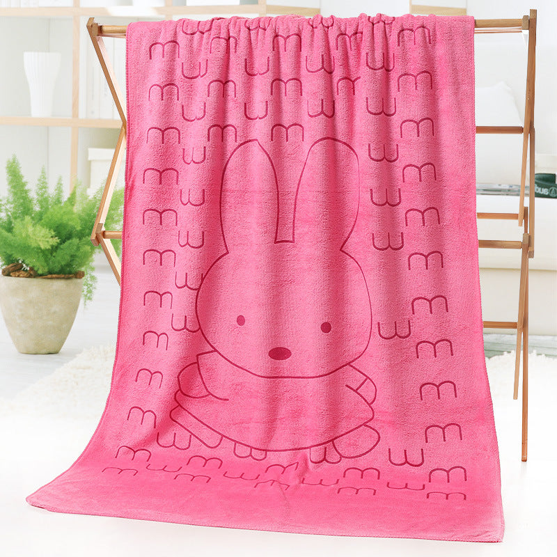 Cartoon print bath towel beach towel in soft fabric, displayed flat for a clear view of the design
