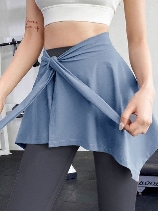 Women’s yoga pants with anti-exposure cover-up skirt for fitness, running, and sports