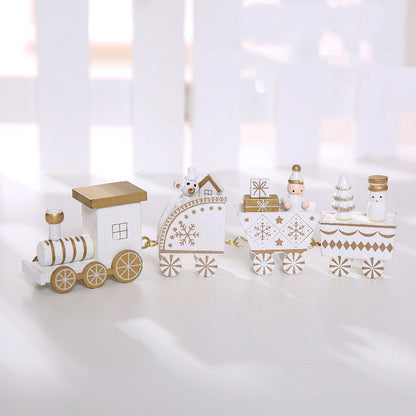 Wooden Christmas train decorations displayed as festive holiday ornaments