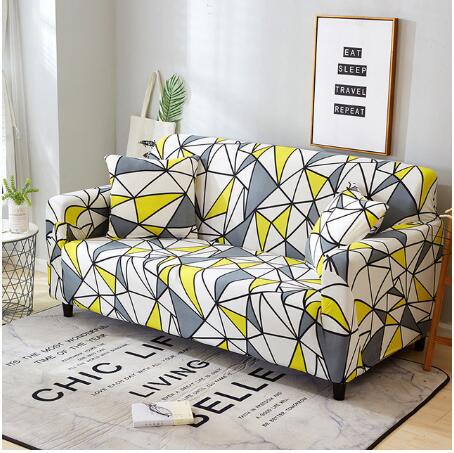 Elastic universal sofa cover in a neutral design, fitted over a standard sofa for a smooth, protective finish