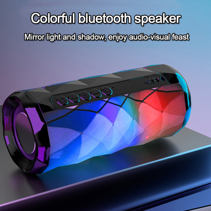 Portable Bluetooth outdoor speaker with card slot and subwoofer in compact black design