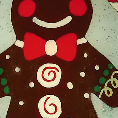 Hand-painted glass gingerbread man Christmas ornament with glitter, featuring a painted mouth, from BACKUPMYFILESNOW® festive holiday decor