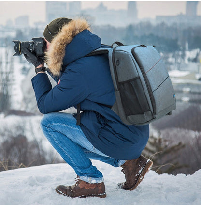 Waterproof camera backpack with padded compartments and adjustable shoulder straps