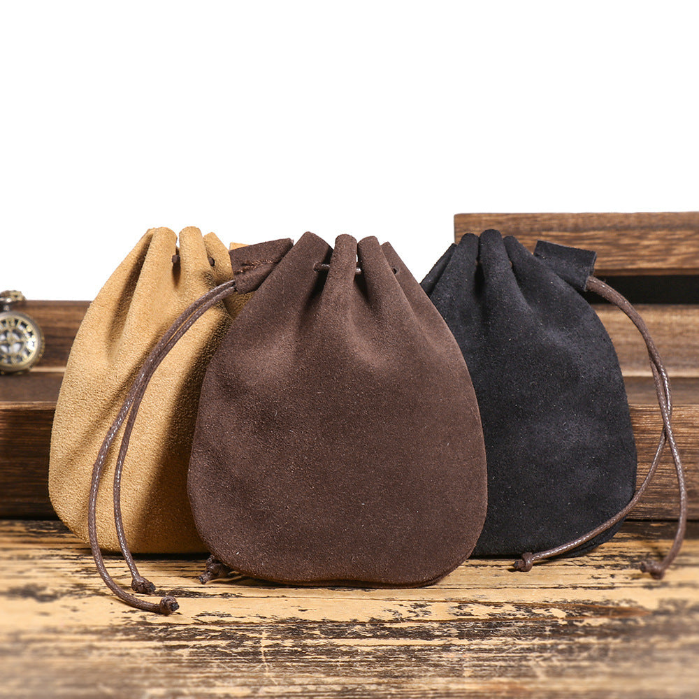 Vintage cowhide braided drawstring storage pouch wallet in a compact, stylish design