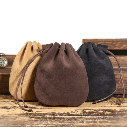 Vintage cowhide braided drawstring storage pouch wallet in a compact, stylish design