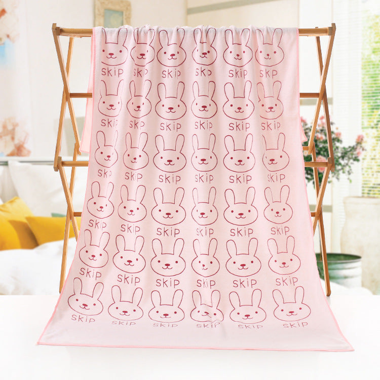 Cartoon print bath beach towel from My Store rolled and displayed flat