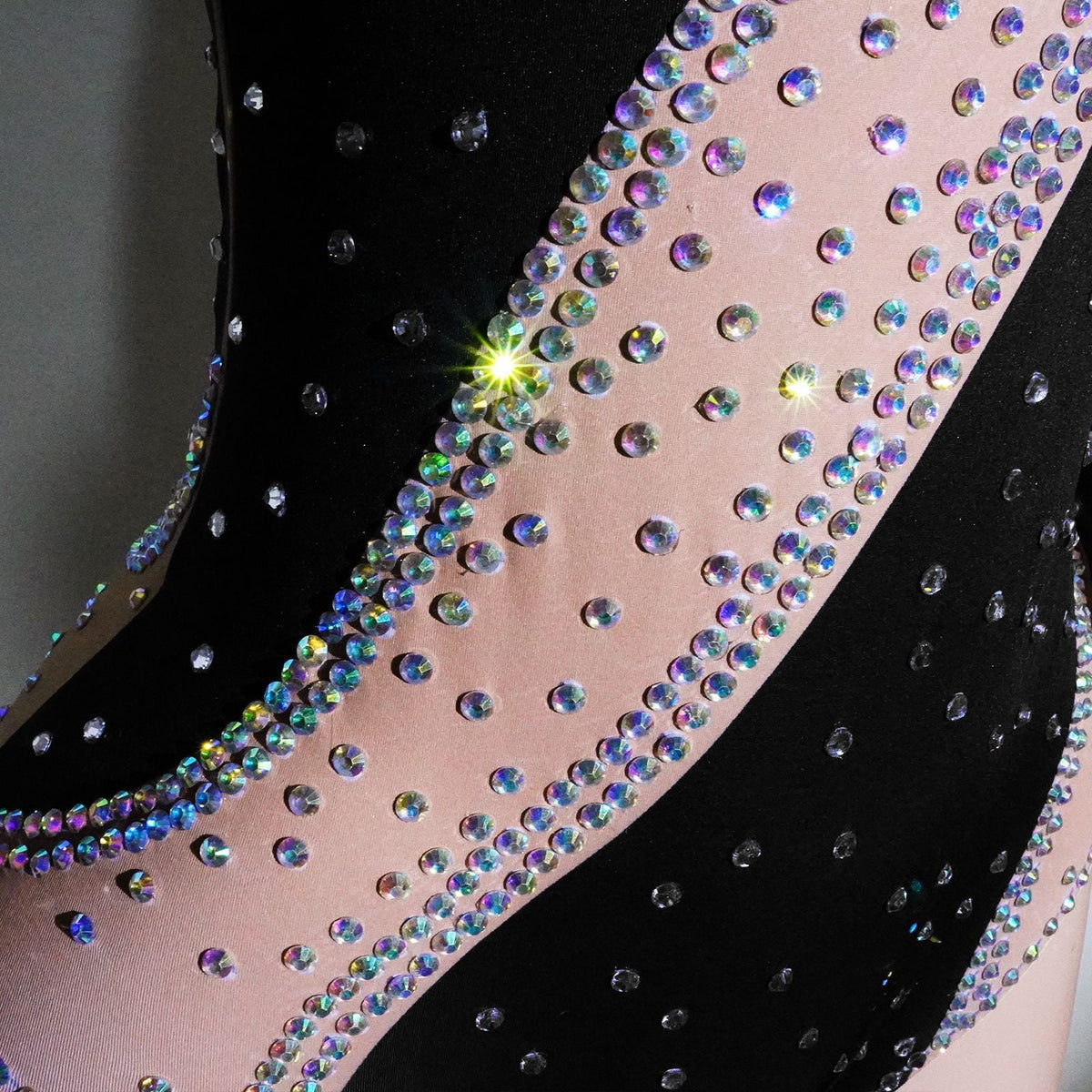 Women's rhinestone mesh patchwork jumpsuit with sparkling details and sheer panels
