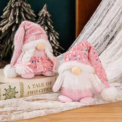 Christmas decorations sequined couple ornaments displayed together for festive holiday decor