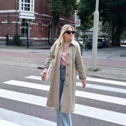 Khaki women’s polo shirt trench coat with single-breasted front, featuring a classic collared design