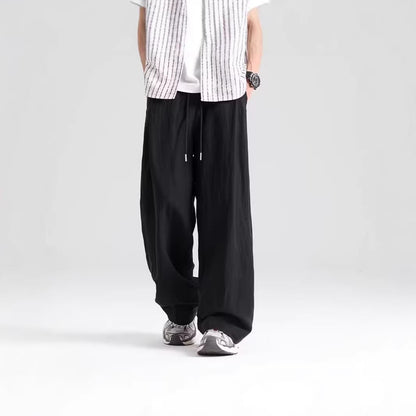 Men's draped breathable ice silk athletic pants in a relaxed fit and lightweight fabric