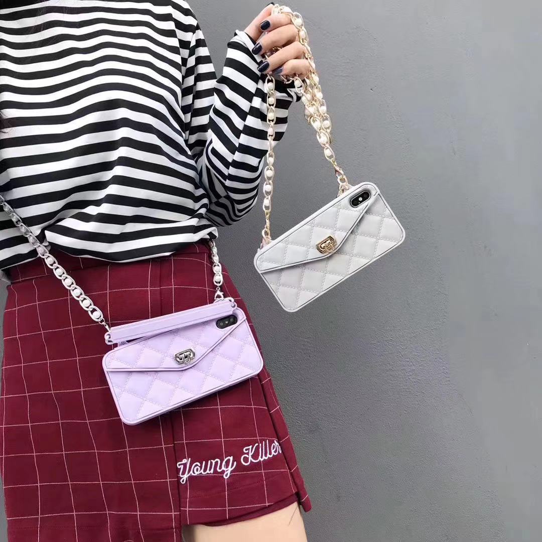 Luxury women's mobile phone case with inclined chain lanyard, elegant protective phone cover ensuring hands-free carry