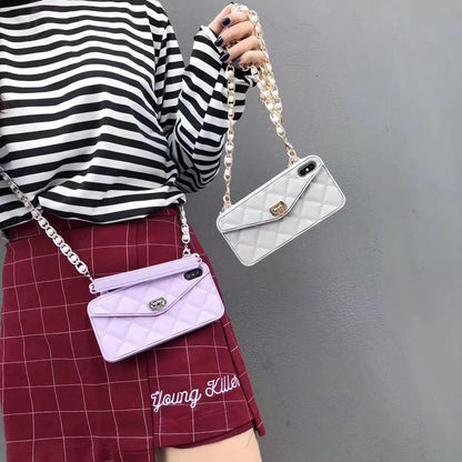 Luxury women's mobile phone case with inclined chain lanyard, elegant protective phone cover ensuring hands-free carry