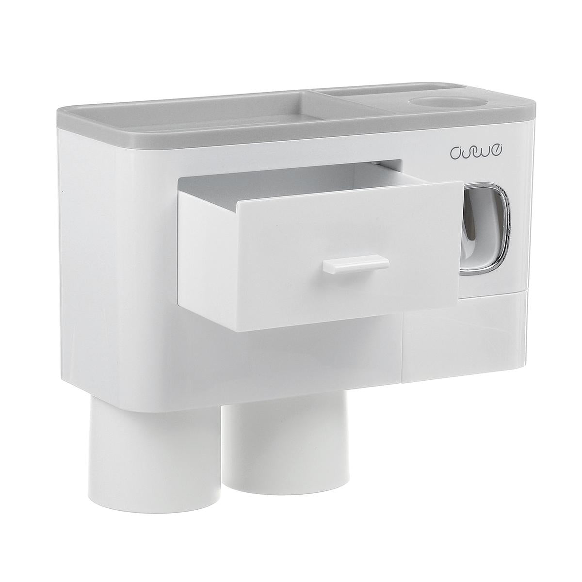 Hanging magnetic toothbrush holder with single drawer, toothpaste squeezer, and non-marking adhesive rack
