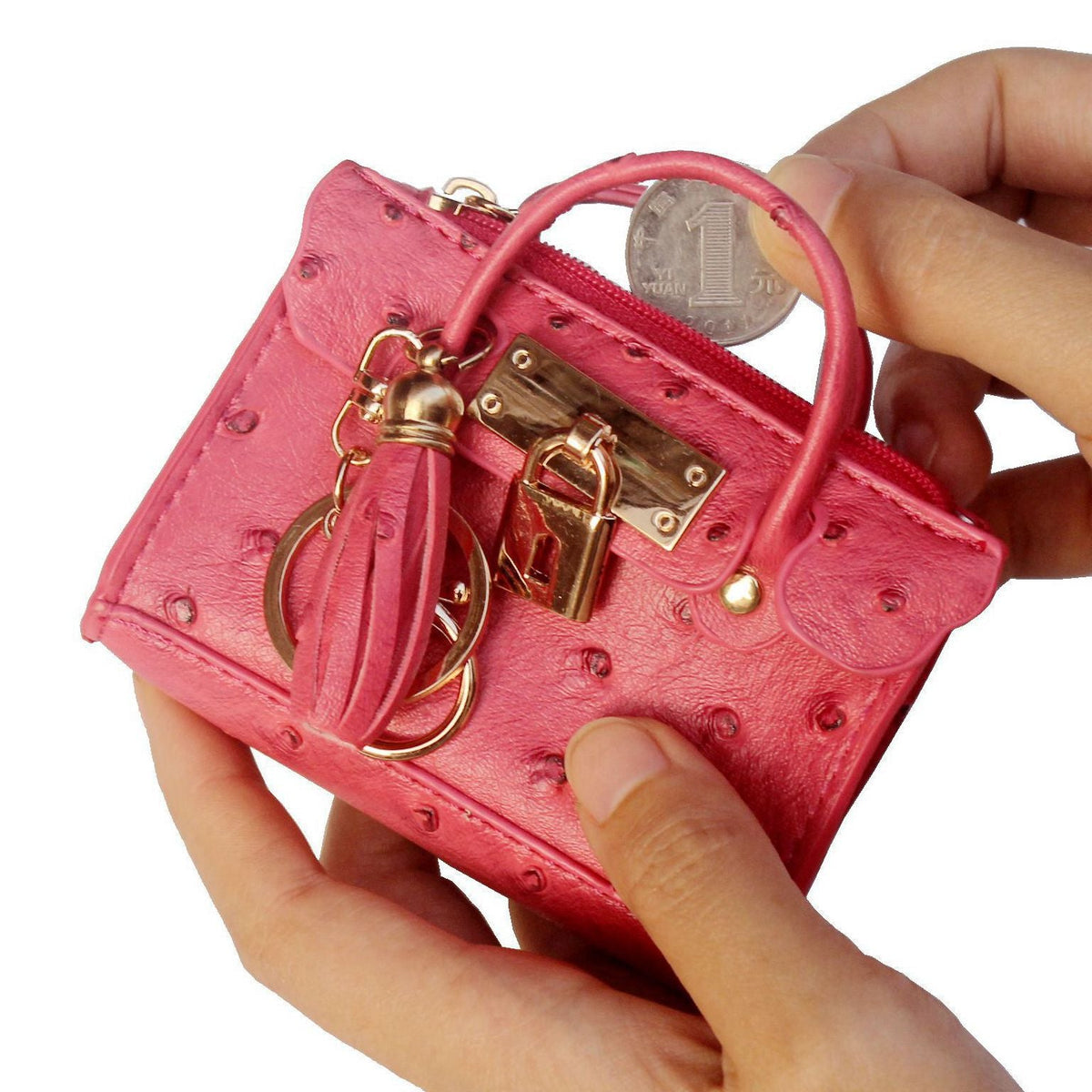 Leather solid color fashion tassel mini handbag in a compact design with decorative tassel detail
